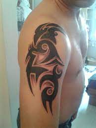 Tribal curved tattoo on lower belly. 120 Sexy Tribal Tattoos Designs And Ideas