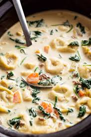 Place broth and next 8 ingredients (through garlic) in slow cooker; Tortellini Soup Slow Cooker Cafe Delites