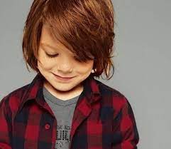 1.9 low bald fade with wavy brushed back hair; 60 Cute Toddler Boy Haircuts Your Kids Will Love