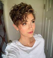 A curly pixie cut is a short haircut for women with naturally curly hair that's cropped into layers, creating a tousled effect. Trending Hairstyles 2019 Short Pixie Hairstyles Curly Pixie Hairstyles Short Hair Styles Pixie Hair Styles