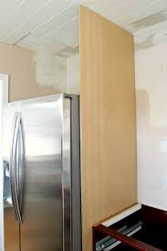 Building the cabinet above the fridge. How To Build A Diy Refrigerator Cabinet Chatfield Court