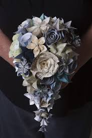 On this episode of shark tank breakdown, we are covering eco flower! Cascading Handmade Origami Paper Flower Bridal Bouquet This Bouquet Features Book Pages Harr Paper Flowers Wedding Bouquet Paper Flower Bouquet Paper Flowers