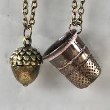 Peter Pan Wendy Kiss Thimble And Acorn Necklace I Love This And It Gives Me Ideas Peter Pan Jewelry Peter Pan Necklace Acorn Necklace