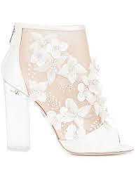 Love Meghan Markle S Timeless White Wedding Shoes Get The Look Here Bridal Boots Wedding Shoes White Wedding Shoes