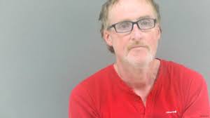 Local man charged with breaking and entering