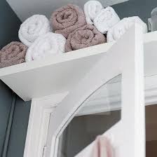 Small home expert emma healey of little house lovely home loves the mirrored cabidor deluxe behind the door storage cabinet, which cleverly mounts on the door hinge. Decorating Ideas For Small Bathrooms Small Bathroom Organization Small Bathroom Storage Creative Storage