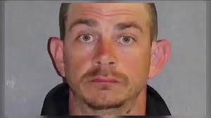 Football coach accused of punching players