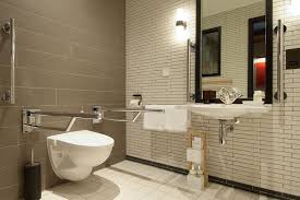Accessible Hotel Design Designing For Accessibility Motionspot Toilet Design Accessible Bathroom Disabled Bathroom