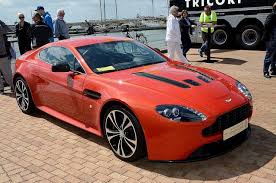 Image result for Fire Red 2012 Aston Martin