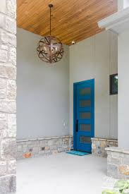 Custom Home Builder Tulsa Ok Home Exterior With Siding And Rock Boxcar Ceiling On Porch Custom Home Builders House Exterior Custom Homes