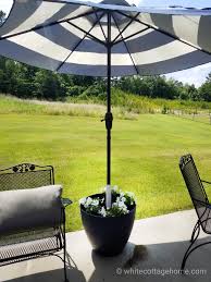 Diy Umbrella Stand Planter In 2020 Outdoor Umbrella Stand Outdoor Umbrella Offset Patio Umbrella
