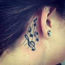 Musicians attempt to play the random music notes on clueless idiots' tattoos! Pretty Musical Notes Tattoo On Behind Ear Neck Tattoos Women Behind Ear Tattoo Music Tattoos