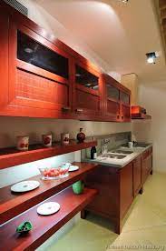 Or, you could always add a glass panel to cabinet doors to open up your cabinets, as this blogger did. Kitchen Idea Of The Day Not Too Dark Not Too Light Medium Stained Wood Kitchens In Cheap Kitchen Cabinets Small Kitchen Decor Types Of Kitchen Countertops