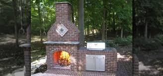 The natural look and feel of the faux stone panels are a perfect replacement for the old chimney covering, and it gives the chimney a beautiful, elegant look. How To Build An Outdoor Brick Fireplace Construction Repair Wonderhowto