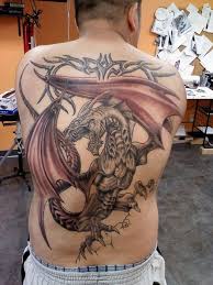 The tattoo design file will also include a pattern for adding a red flaming drop shadow. Dragon Side Tattoos For Men Novocom Top