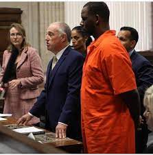 Photos+Video: R. Kelly handcuffed in court - Adomonline.com
