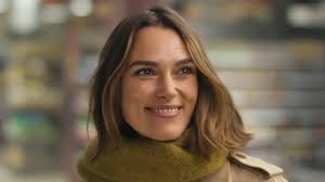 Keira Knightley wears £29 green scarf in the new Waitrose Christmas ad