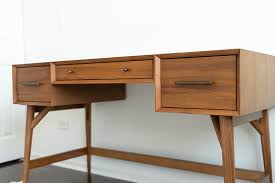 One of my favorite aspects of this desk are its two deep drawers on the sides. West Elm Mid Century Desk Review Viv Tim