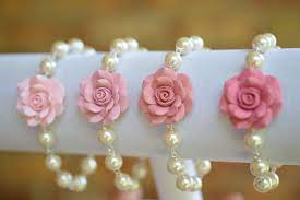 1 Pcs Pink Shade Rose And Pearls Bracelet Hot Pink Rose Etsy In 2021 Wedding Flower Jewelry Flower Bracelet Rose Bracelet