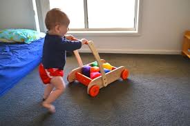 How To Introduce The Walker Wagon Baby Walker Toy Kids Walkers Infant Activities
