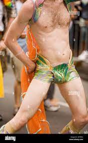 Gay man in costumes dancing at a gay parade Stock Photo - Alamy