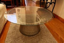 The iconic side table is created by welding curved steel rods to circular frames, simultaneously serving as structure and ornament. Warren Platner Coffee Table