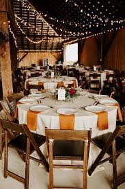 Rust Fall Table Linens This Rust Infused Reception Color Palette Screams Fall In The Chicest Way Possible Fall Wedding Tables Rustic Fall Wedding Cozy Wedding