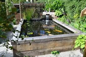 Creating Raised Ponds In Your Garden Fish Pond Gardens Ponds Backyard Garden Pond Design