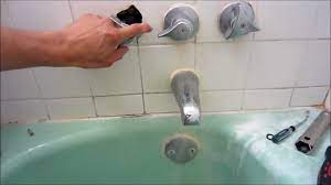 The bathtub faucet handle will have a decorative cover. How To Stop A Dripping Bathtub Faucet Nj Plumbing Repair Replacement And Maintenance