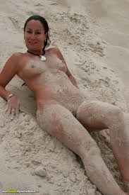 Roxeanne Naked in the sand n surf