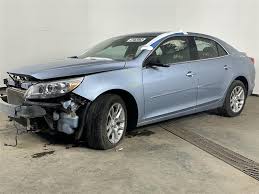 Image result for Silver Topaz 2013 Malibu