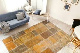 faye vloerkleed goud 200cm x 290cm vloerkleed kleurrijke kussens vloerkleed eetkamer