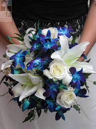 Natural touch off white roses, turquoise hydrangea and bling accents silk wedding bouquet. Pin By Erika Wa On Wedding Bouquets We Love Blue Orchid Wedding Blue Wedding Bouquet Lily Bouquet Wedding