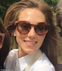 Jacqui Ainsley and Guy Ritchie kiss in wedding photo at Ashcombe House