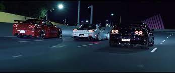 Nsfw posts are not allowed. Hd Wallpaper City Lights Night Car Nissan Skyline Gt R R34 Nissan Skyline Gt R R33 Wallpaper Flare