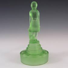 I cannot verify the age or artist/company but cat statue could have originated from france. Rare Art Deco Uranium Green Glass Girl Dog Figurine 294 50