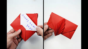 Fold the top corner of the kimono over to form a v shape, as shown in the image. How To Make Origami Card For New Year Diy Surprise Gift Card Youtube