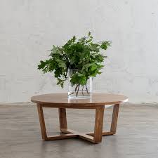For instance, a round glass coffee table gives a modern and clean impression. Amara Mid Century Modern Timber Round Coffee Table Wooden Top Coffee Table Living By Design