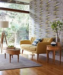 Dark grey sofa, dove grey curtains, yellow textiles and a vase. Yellow Sofa Living Room Ideas Novocom Top