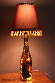 Fill the bottle all the way to the brim, making sure there is no space between the oil and the bottle cap. Recycled Diy Bottle Lamps Diy Bottle Lamp Easy Christmas Diy Diy Bottle Crafts