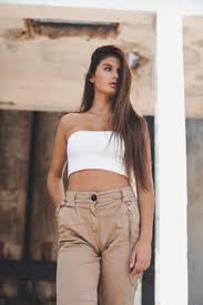 Dark hair and pale skin as an indication that a character is beautiful. Portrait Of A Fashionable Teenage Girl With Long Brown Hair Stockphoto