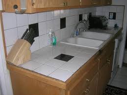 Because the ledge of the sink is attached underneath the counter, it creates a smooth surface that's preferred by many. Kitchen Counter Tiles Makeover Convert Or Redo Ceramic Tile Advice Forums John Bridge Ceramic Tile