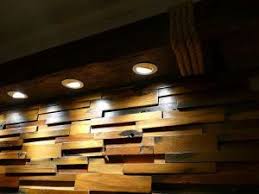 Faux wood ceiling beams with recessed lights are one way to add lighting accents to the room without having to install the lights directly into the ceiling. Pendant Light Wood Beam Recessed Lighting Glass Metal Industrial Light