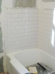 Go for the classic subway tiles which fit for almost all bathroom style. How To Install Subway Tile In A Shower Marble Floor Tiles Young House Love