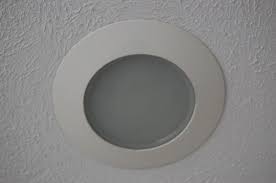 Snap the pinhole trim cover onto the pinhole trim. A Stylish Eco Friendly Solution For Recessed Lighting Happy Simple Living Recessed Light Covers Recessed Light Bulbs Recessed Lighting