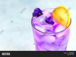 Add a small amount of food coloring to the water before putting in ice cube trays and freezing. Purple Haze Cocktail Image Photo Free Trial Bigstock