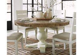 Faux marble dining table set. Grindleburg Round Dining Room Table By Ashley A M Discount Furniture