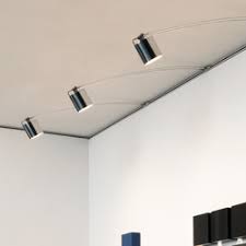 Versatility and effectiveness track lighting has a very simple style, as it is quite literally just a straight bar that sits attached to the ceiling, and the lights can then be moved along the track so that they face the areas. Led Line Suspended Lights From Buschfeld Design Architonic