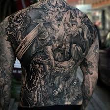 What an amazing design that crosses the whole shoulders. Catholic Faith Tattoo Ideas Designs Tattoo Ideas