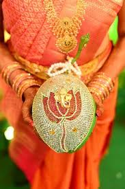 South Indian Decor Embellished Swrovski Coconuts With Lotus Detailing Wedmegood Coconut Decoration Indian Wedding Decorations Beautiful Wedding Decorations